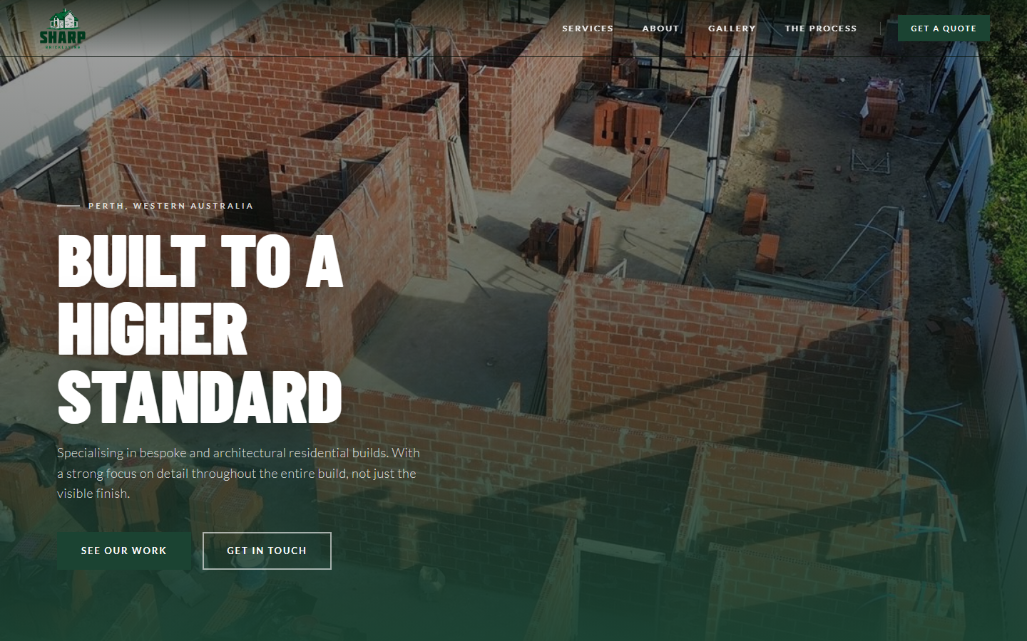 Hero — full-viewport aerial drone carousel, "Built to a Higher Standard" headline, dual CTAs